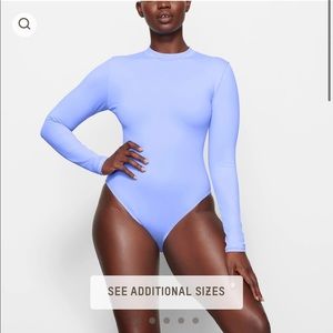 Skims Swim Long sleeve onepiece